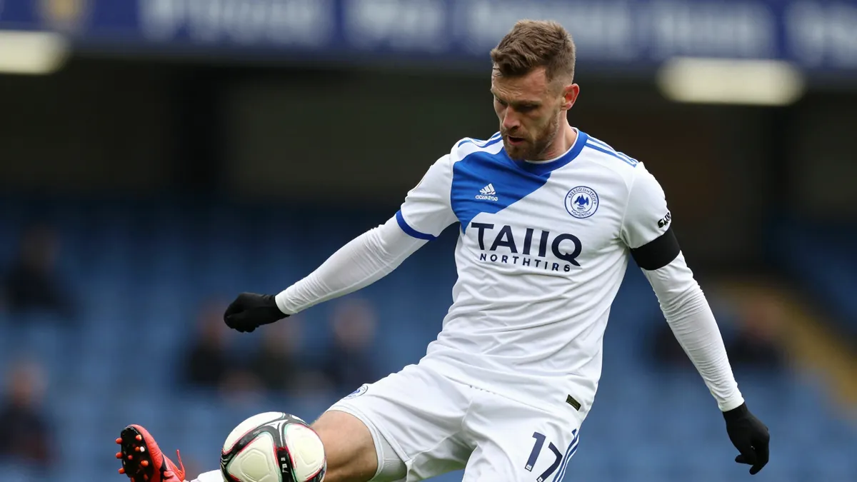 Huddersfield Town's League One Win Puts Pressure on Preston's Championship Title Hopes